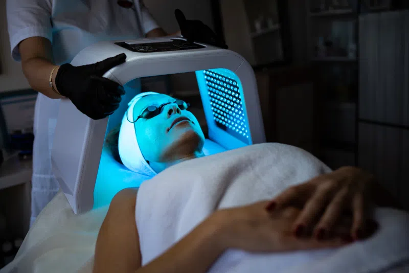 LED light therapy for skin rejuvenation, acne reduction, and improved skin tone.