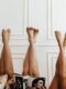 Four women relaxing with their legs up, representing the visible results of fat freezing before and after treatments.